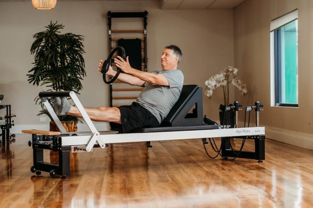 Reformer Bed vs. Pilates Reformer Machine